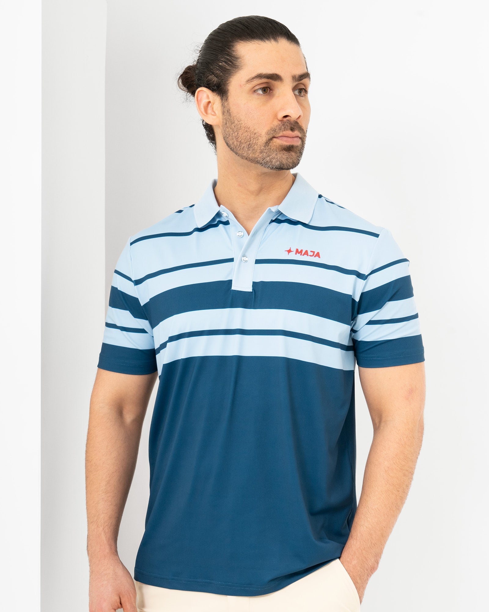 Polo Pure Line, Rayada azul, vista frontal, fit Regular, Poliéster, con Tela estiramiento 4 vías, uso versátil