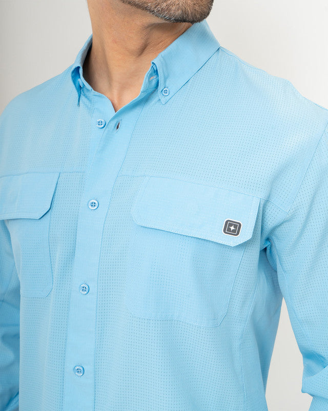 Camisa Pescadero, Azul cielo, vista lateral, fit Relajado, Poliéster, con Tela estiramiento 4 vías, ideal para oficina